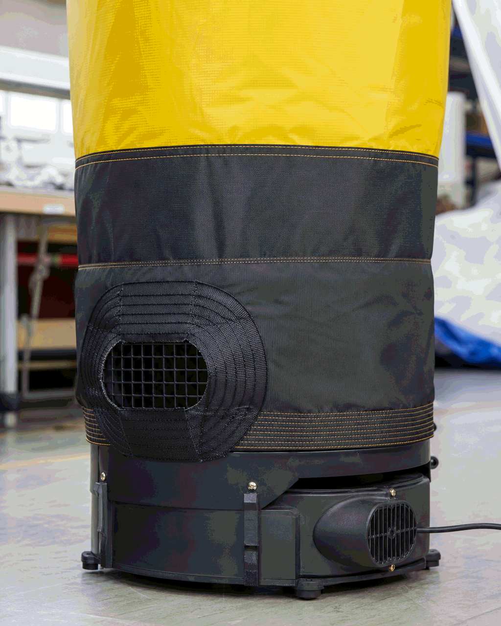 Close-up printed textile and attachment detail on a custom air dancer