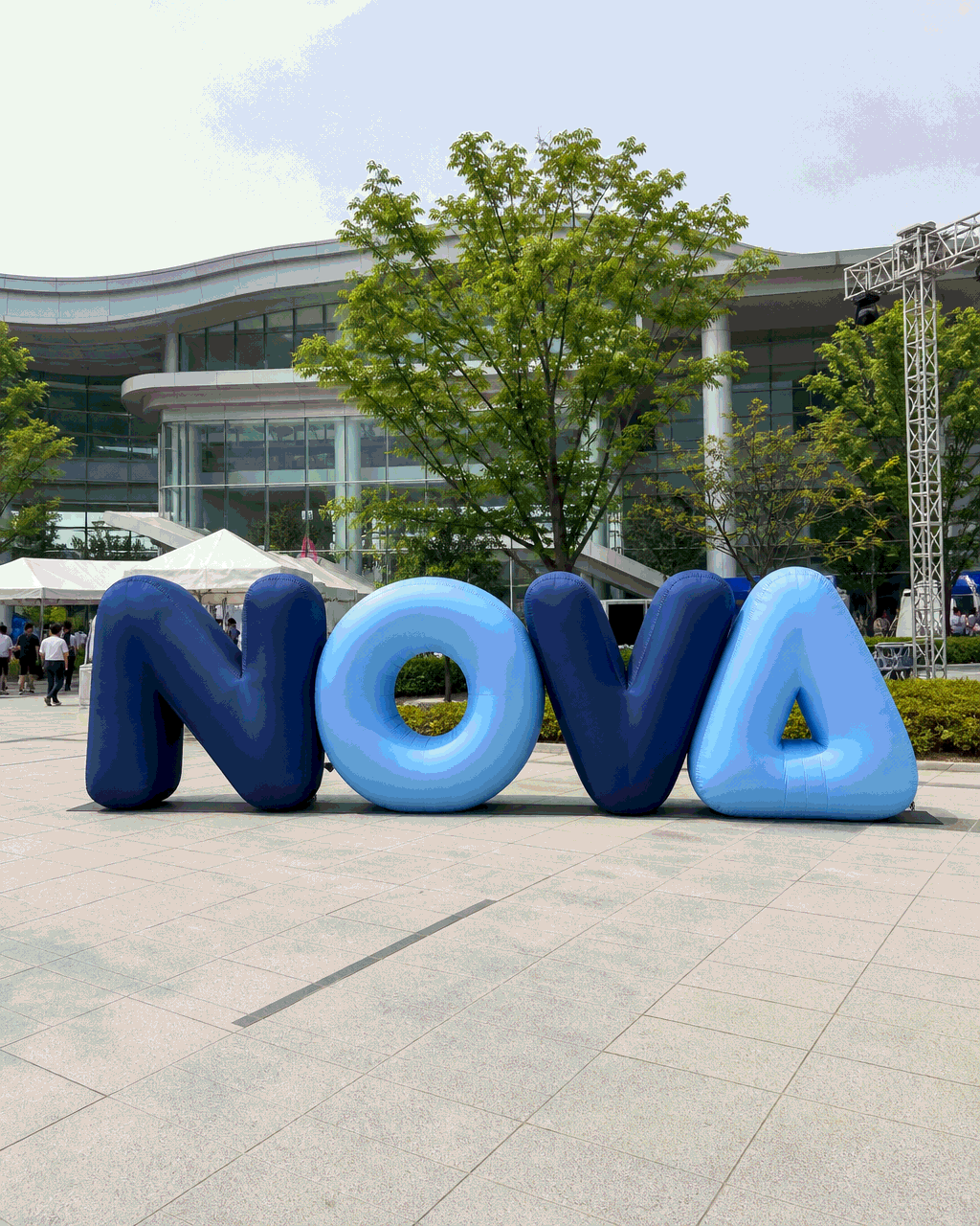 Custom inflatable logo sign at a branded event installation