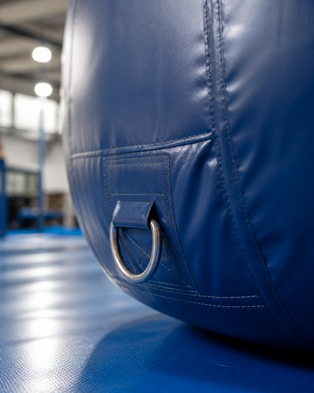 Close-up printed face and seam detail on a custom inflatable mascot